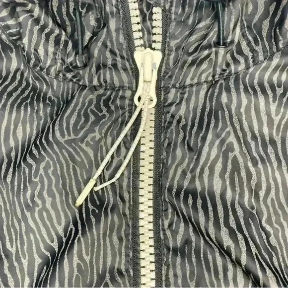 NIKE Women's Zebra Reflective Windbreaker
Size Medium - Picture 8 of 10